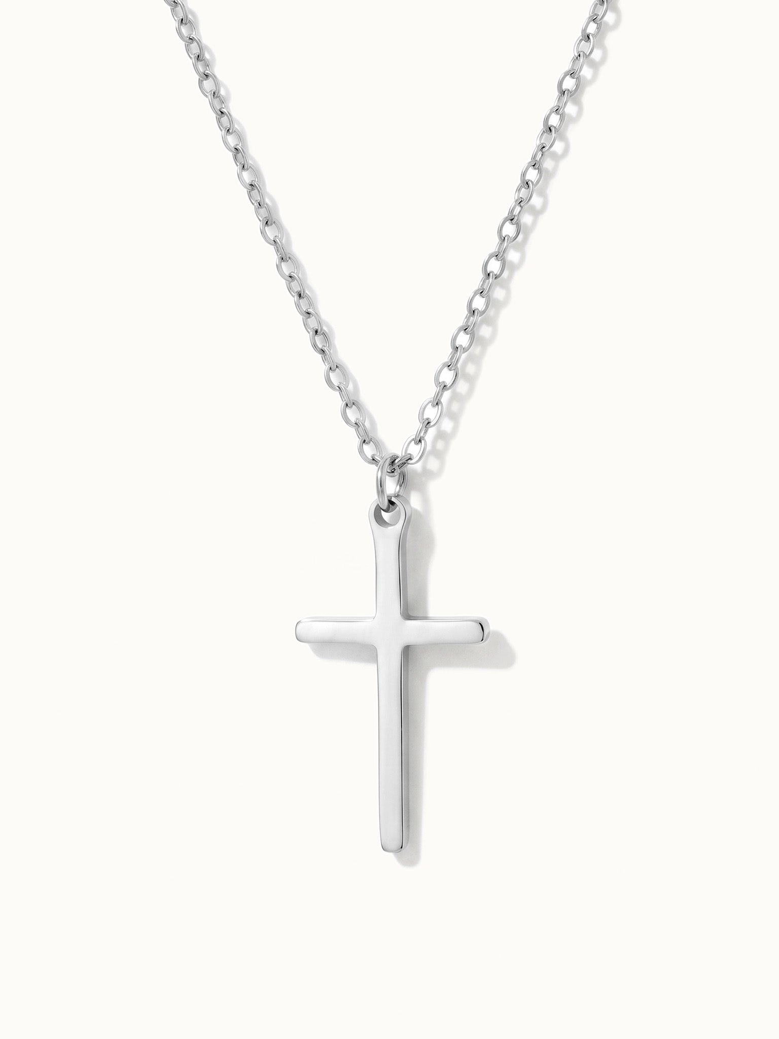 Steadfast Cross Necklace in silver, close-up of the cross