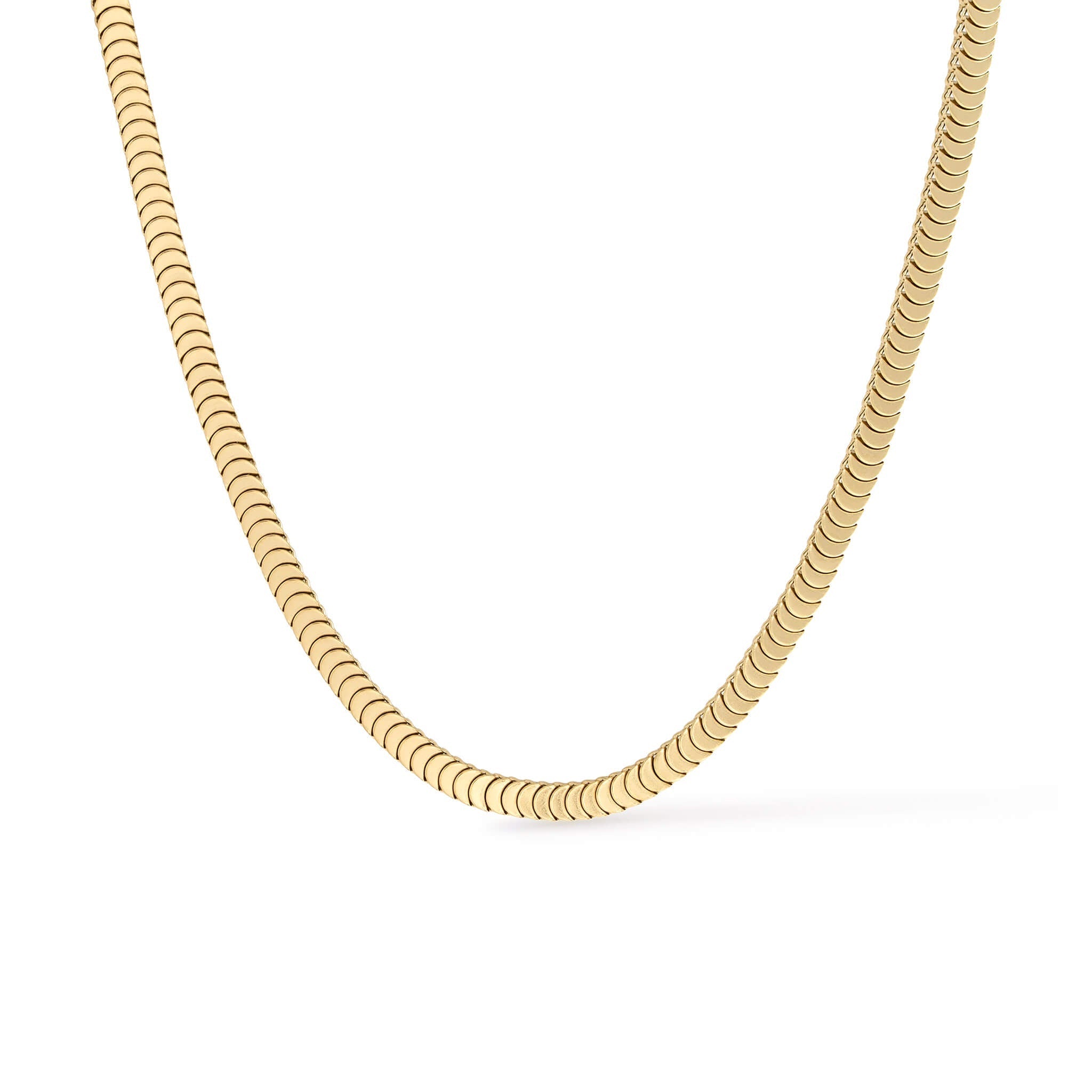 Still Waters Herringbone Necklace – flat herringbone chain curving across the frame, gold, on white background