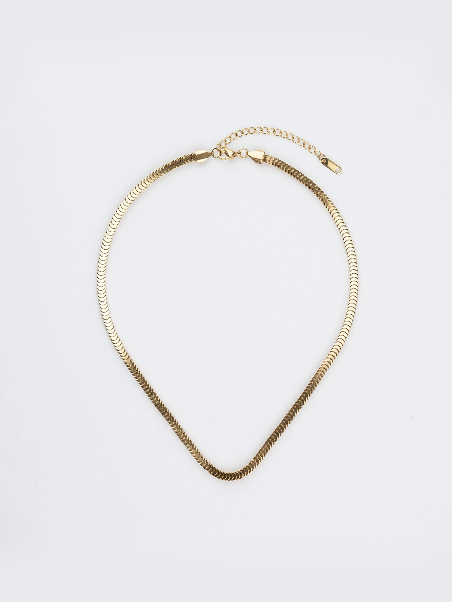 Still Waters Herringbone Necklace – full necklace with clasp and extender, gold, on a light grey background