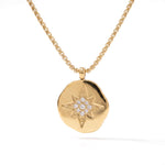 True North Necklace – front view of the star-compass medallion, gold, on white background