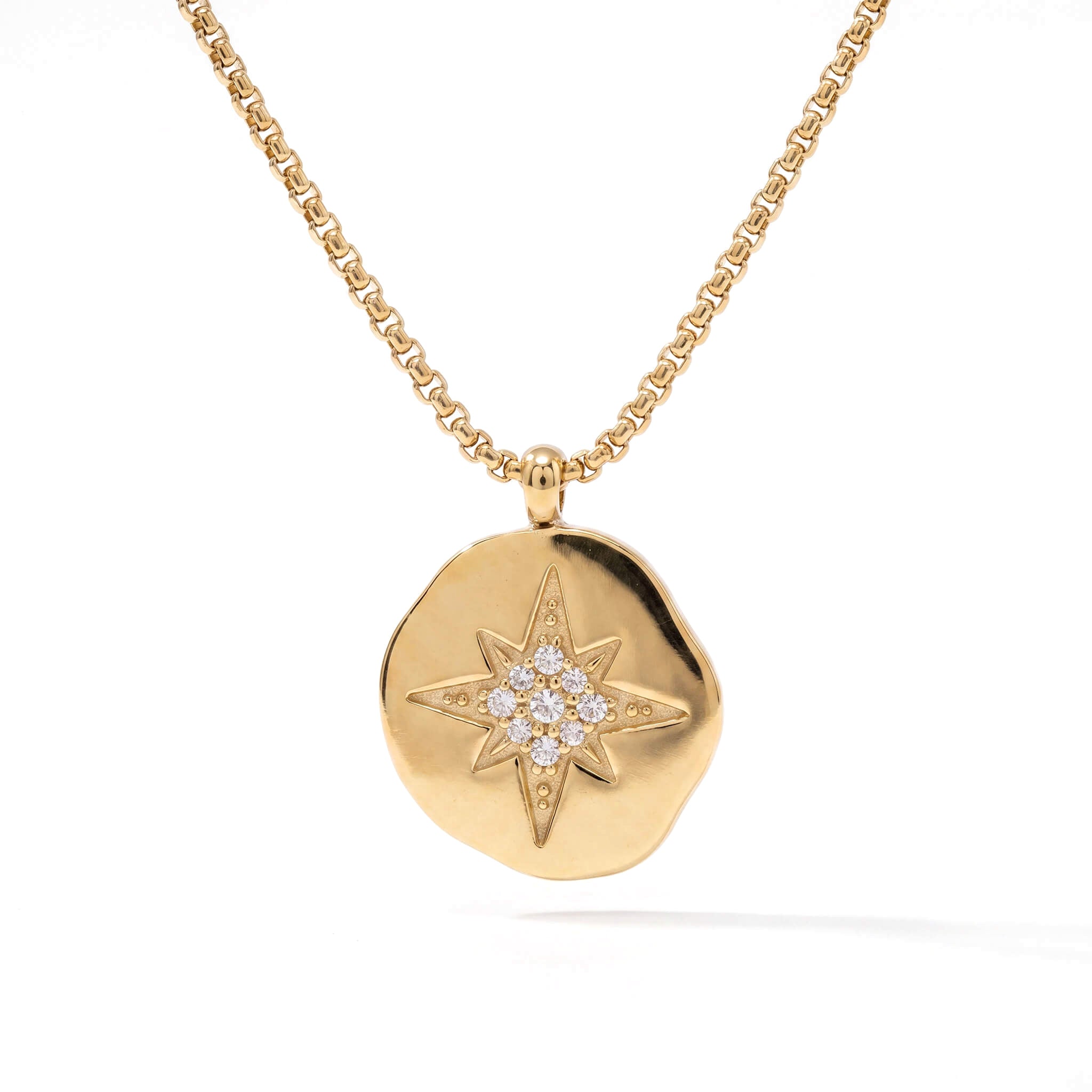 True North Necklace – front view of the star-compass medallion, gold, on white background