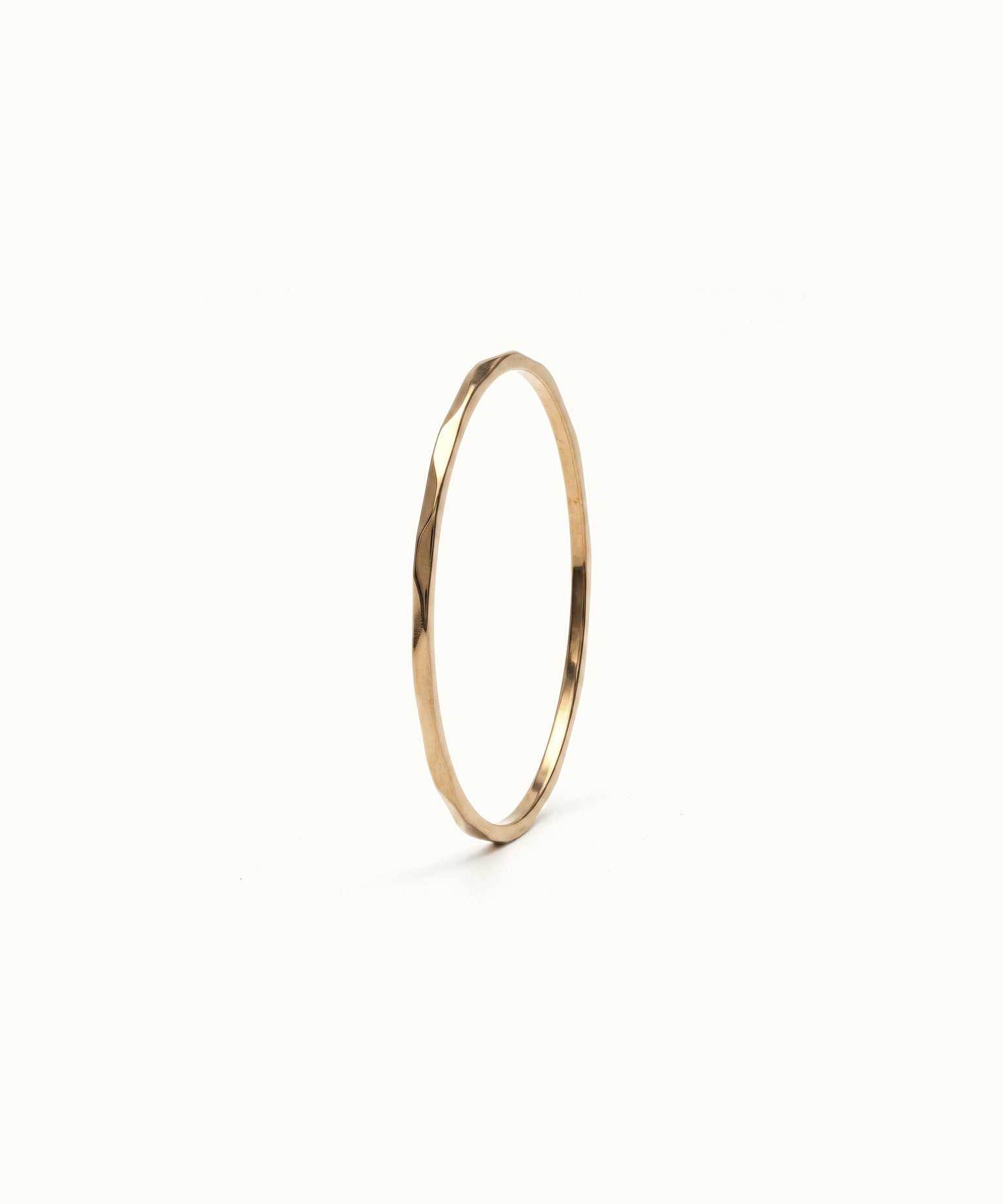 Whisper Band Ring – 45° view, gold, on ivory background