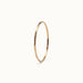 Whisper Band Ring – 45° view, gold, on ivory background