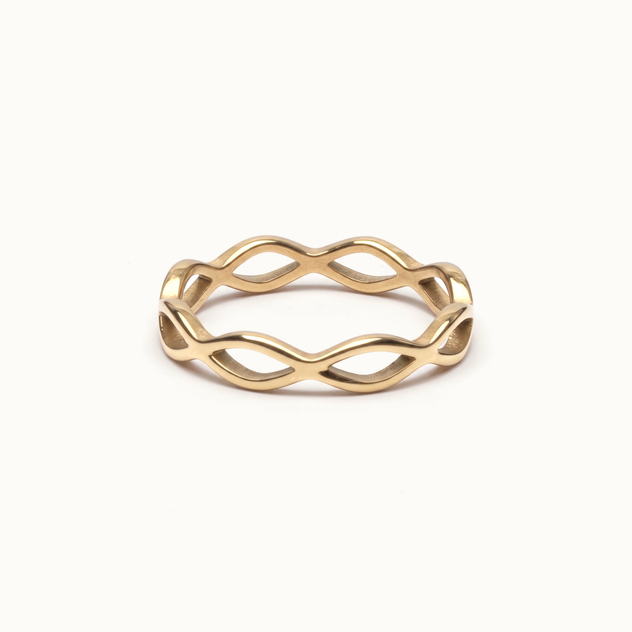Woven Eternity Ring – flat 45° view, gold, on ivory background
