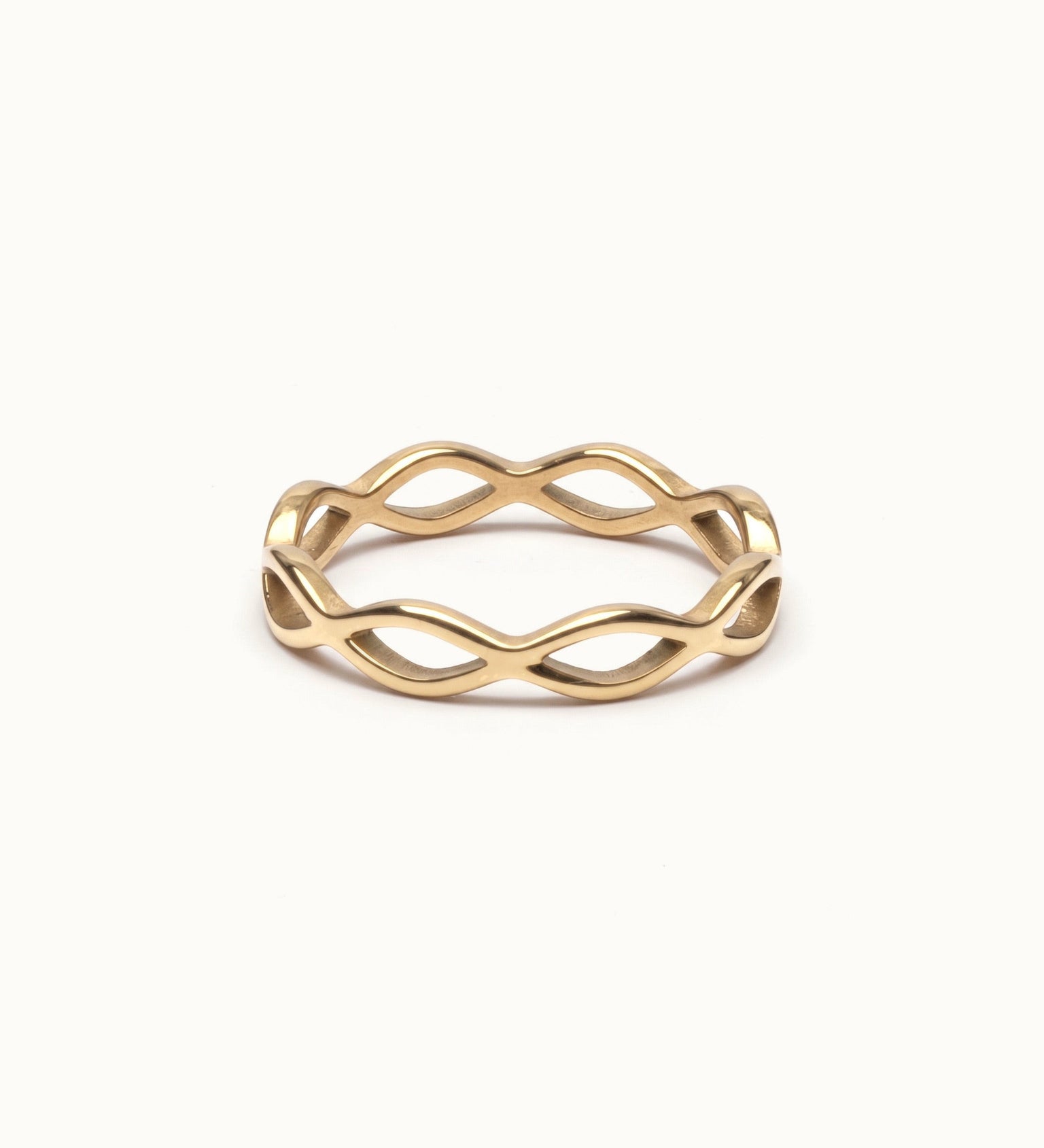 Woven Eternity Ring – flat 45° view, gold, on ivory background