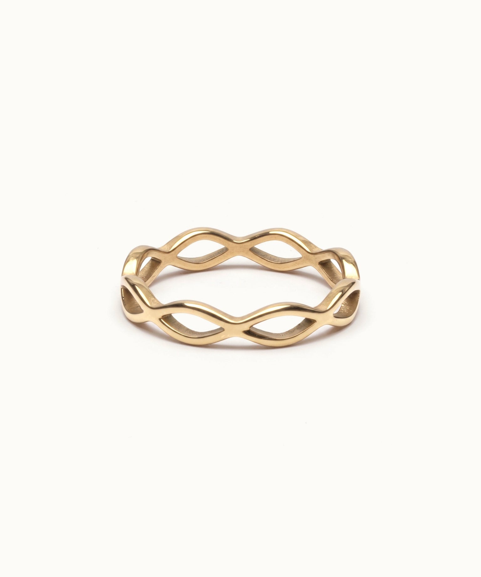 Woven Eternity Ring – flat 45° view, gold, on ivory background