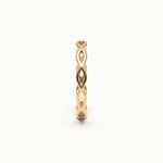 Woven Eternity Ring – front view, gold, on ivory background