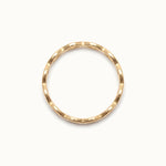 Woven Eternity Ring – side view, gold, on ivory background