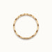 Woven Eternity Ring – side view, gold, on ivory background